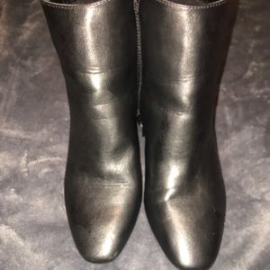 High tip black boots